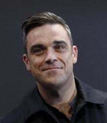 Neben Liedern von Shantel kannst du dir kostenlos online Songs von Robbie Williams hören.